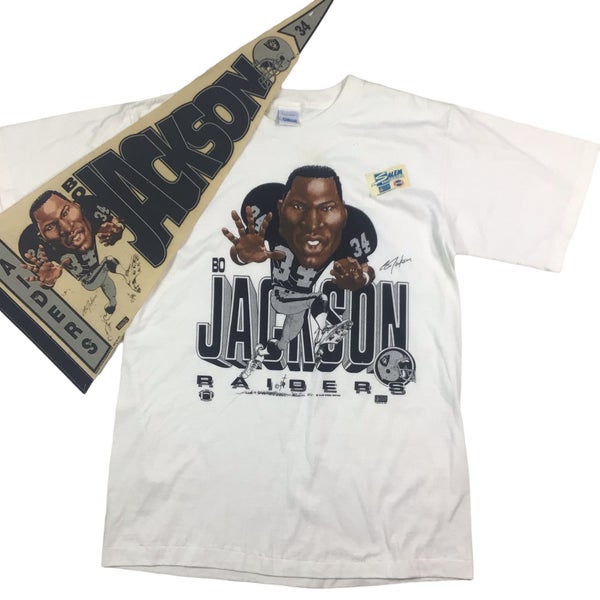 1987 Oakland Raiders Bo Jackson vintage NFL single stitch T- shirt. Tagged  as a large.