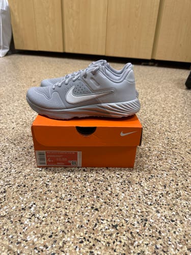 Brand new, in box!! Nike Youth Alpha Huarache Turf, size 4Y, wolf grey/white/platinum