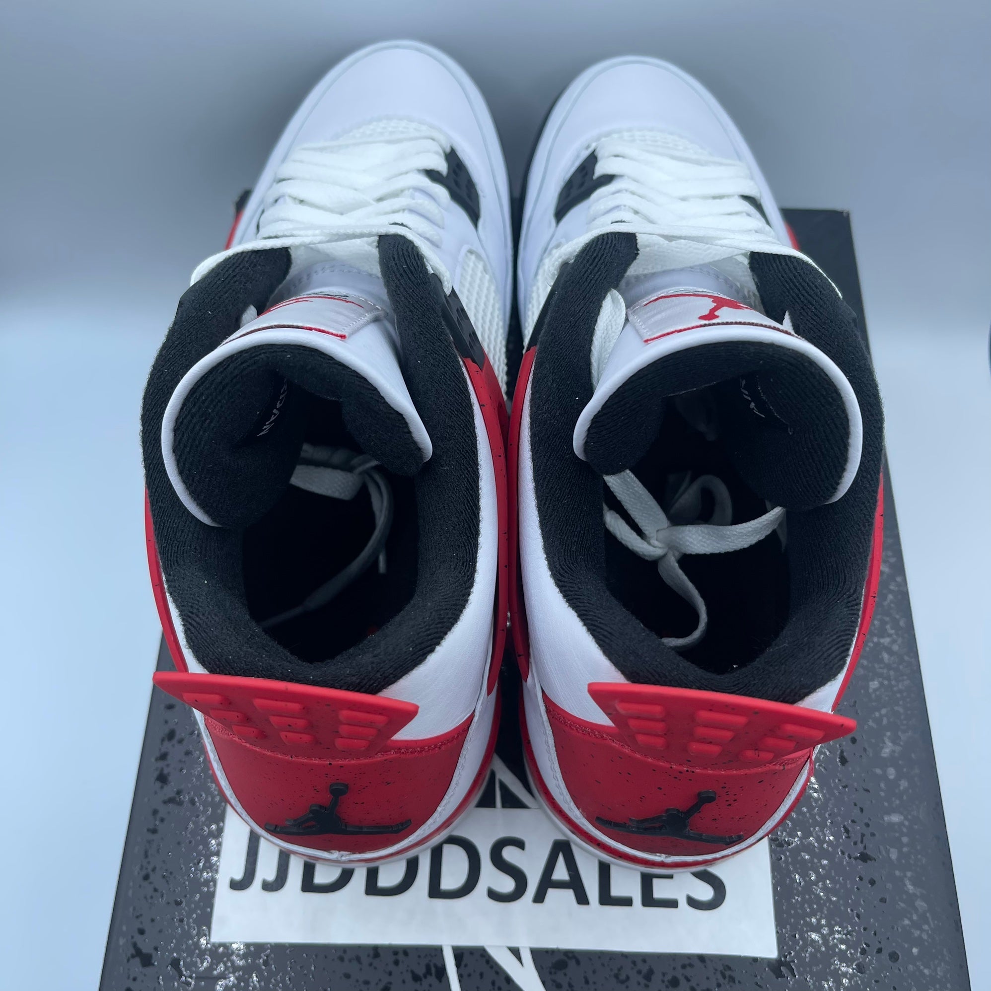 fake fire red jordan 4