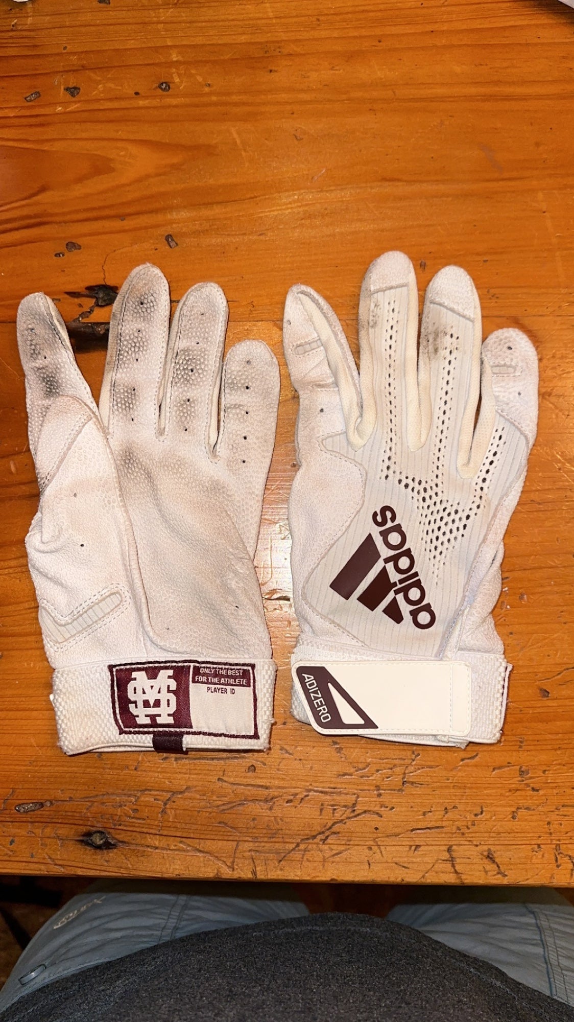 A detailed view of the Adidas batting gloves worn by Julio