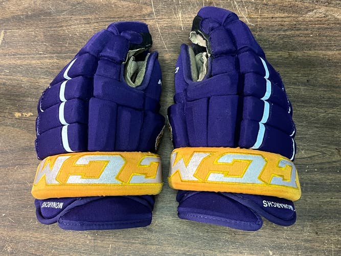 Used CCM Tacks 4 Roll Gloves 14"