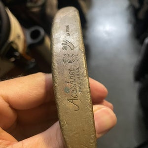 Acusnet bulls eye La femme ladies putter in right hand . Steel