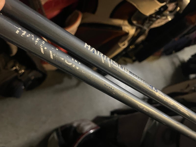 Zero tolerance golf driver and 7 wood in right Hand