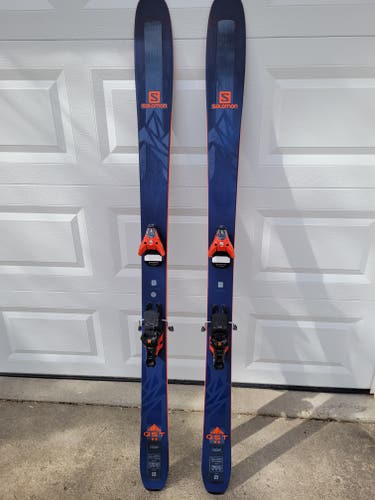 Used Men's 2017 Salomon 188 cm Powder QST 99 Skis With Bindings Max Din 12