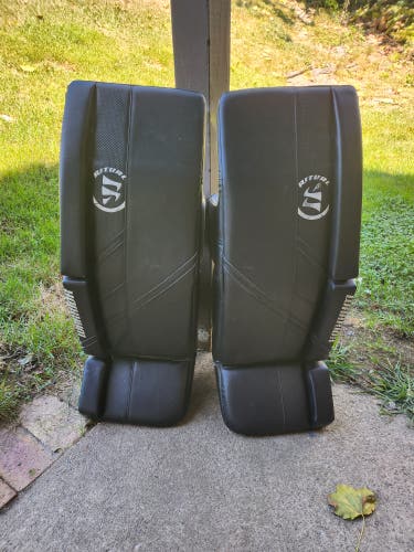 Used 32" Warrior Ritual G5 Goalie Leg Pads