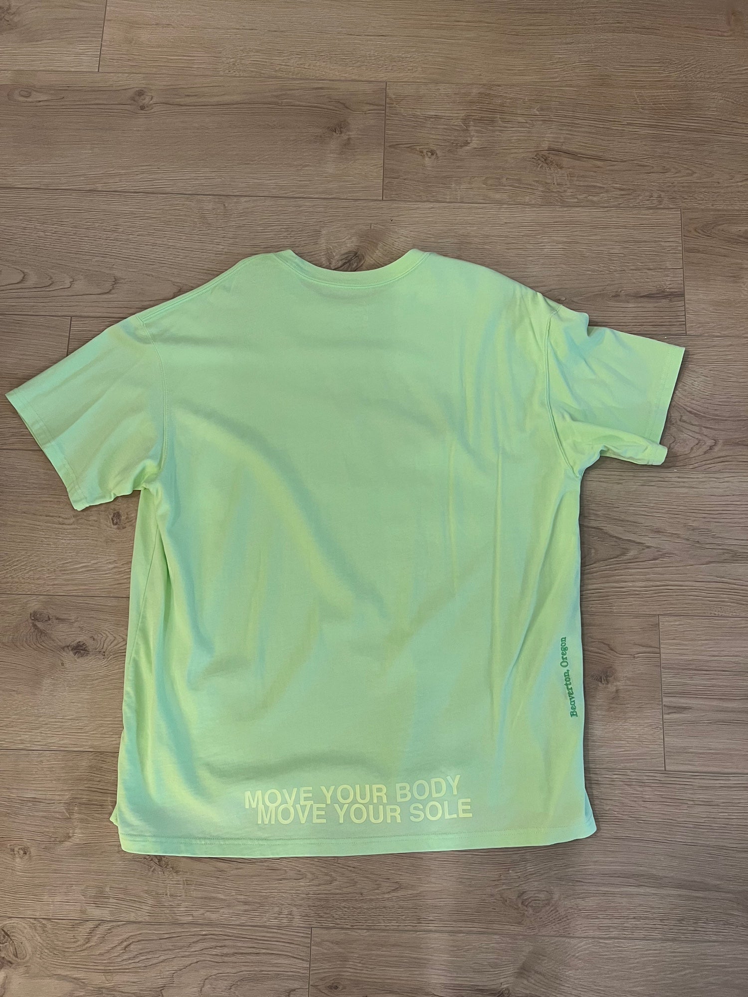 nike world tour t shirt green