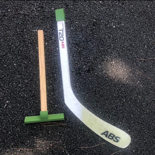Hockey stick handling trainer