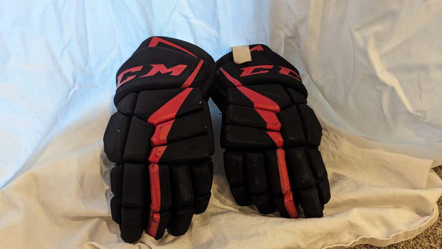 Used CCM Gloves size 15