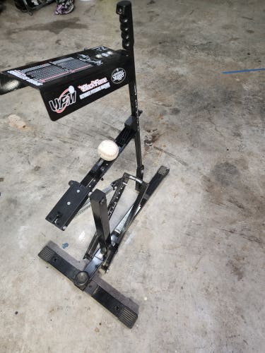 Used Louisville Slugger Black flame pitching machine