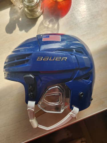 Used Large Bauer Re-Akt 100 Helmet USA Blue