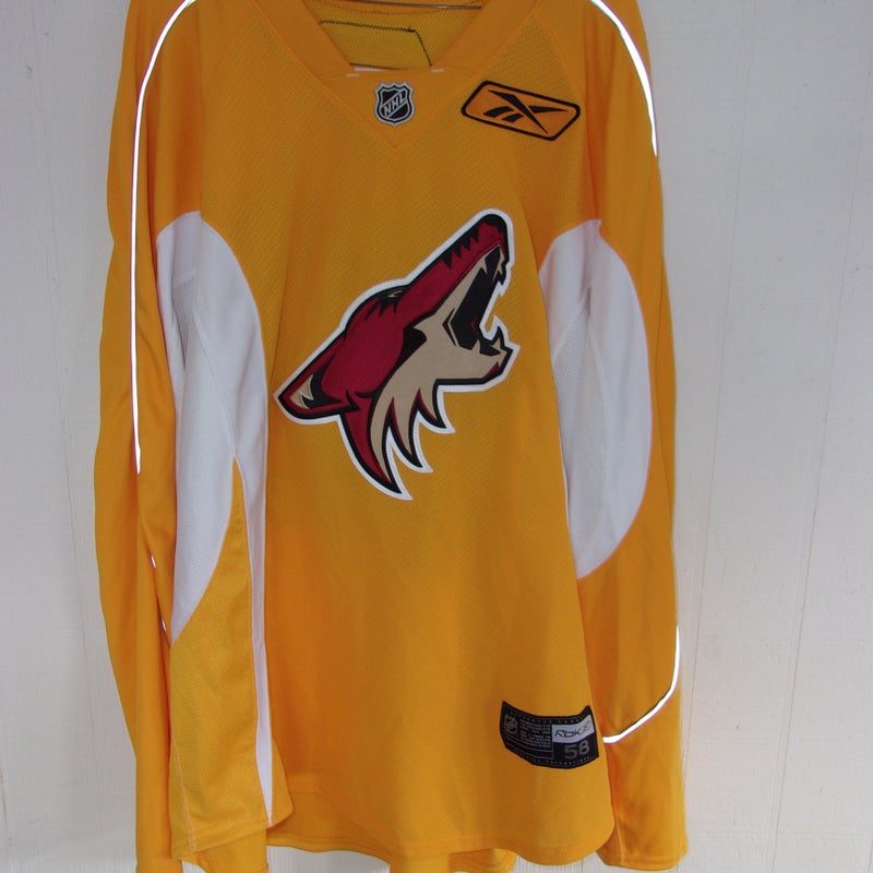 Phoenix Coyotes unused gold #82 Reebok practice jersey size 58 (everything sewn on) from 2009-2011