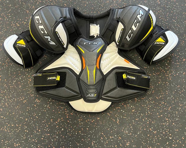 Used CCM Super Tacks AS1 Senior Small Shoulder Pads (In Good Condition)