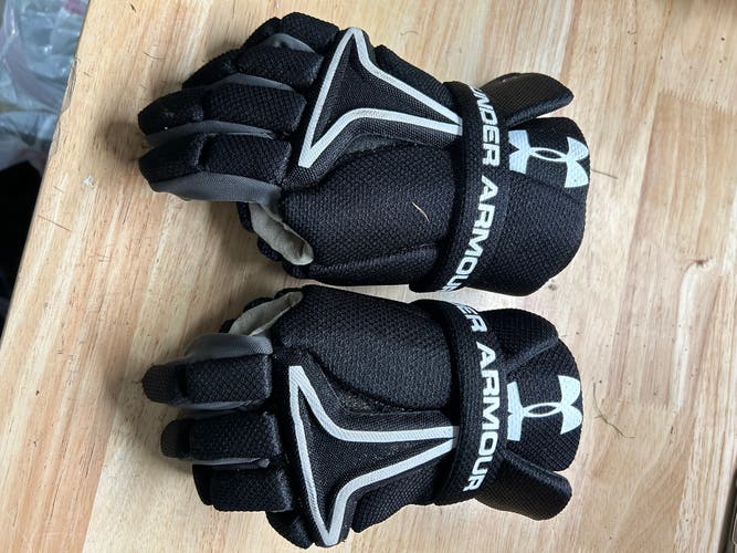 Used Medium Under Armour Gloves And Arm Pads