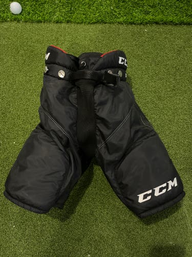 Like new! Black Used Youth Large CCM U+ 04 Hockey Pants