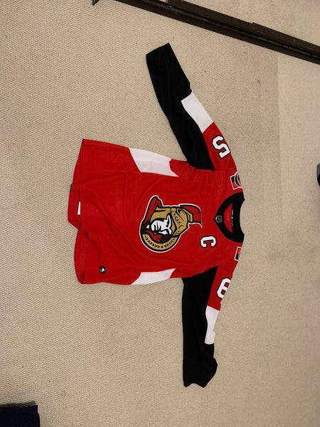 Assorted hockey jerseys
