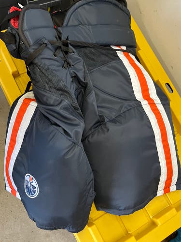 CCM senior medium Edmonton Oilers navy blue hockey pants