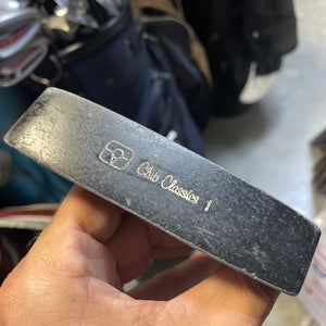 Golf putter club classics in right hand  34 shaft