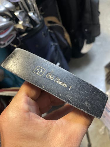 Golf putter club classics in right hand  34 shaft