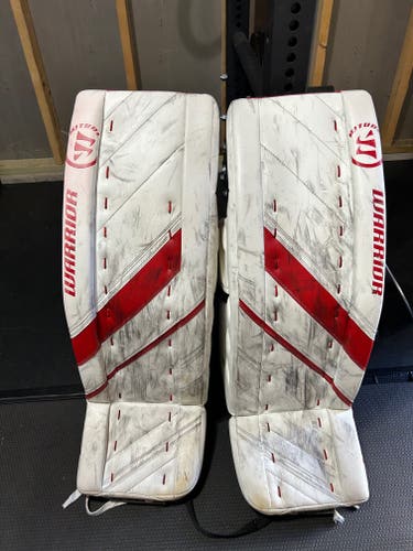 Used 34" Warrior Ritual G4 Pro Goalie Leg Pads (White + Red)