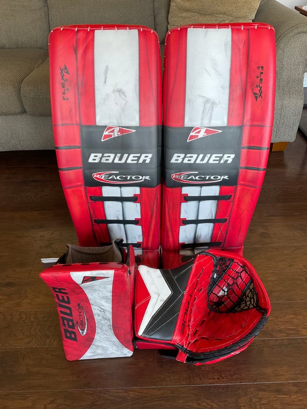 8) Totes of Hockey Gear, Gloves, Shin Pads, Breezers and Goalie Gear -  Roller Auctions