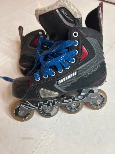 Used size 5 Bauer vapor x40r roller blades
