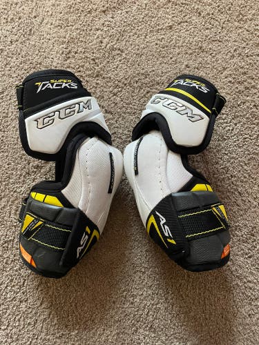 Used CCM  Super Tacks AS1 Elbow Pads Size Junior Large