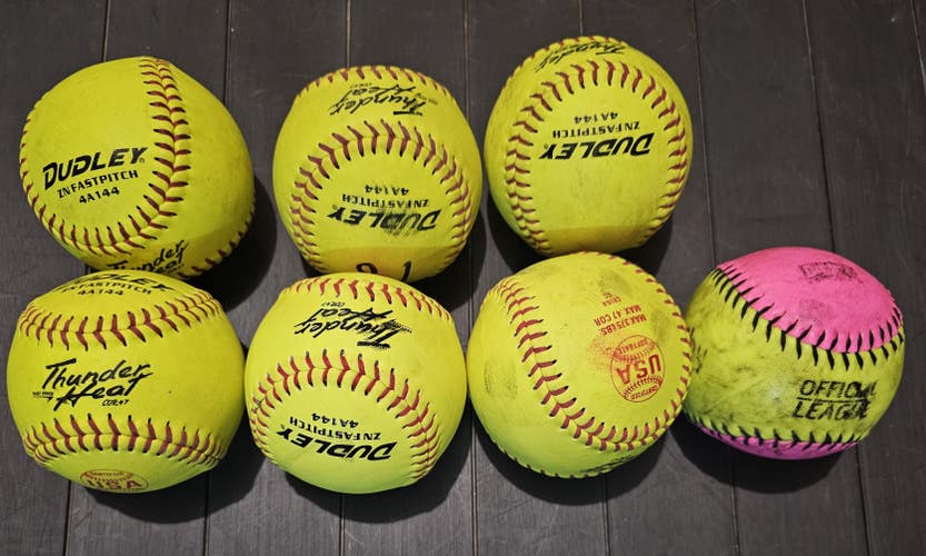 Used Softball 6 Pack 11" Plus bonus ball.