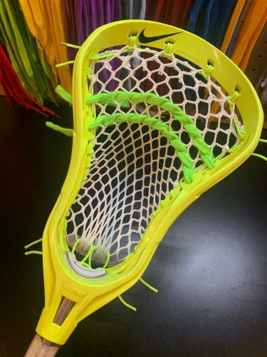 Custom strung Nike Alpha U Mens lacrosse head w/ semi-hard mesh