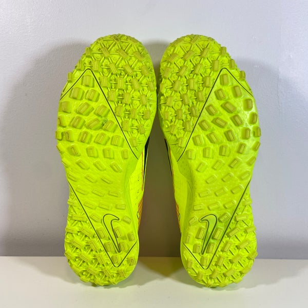 yellow nike astro turf