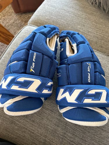 Used CCM 14" Tacks 4 roll pro 2 Gloves