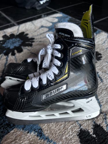Youth Used Bauer Supreme Ignite Pro Hockey Skates Regular Width Size 12