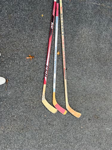 3 Used Hockey sticks