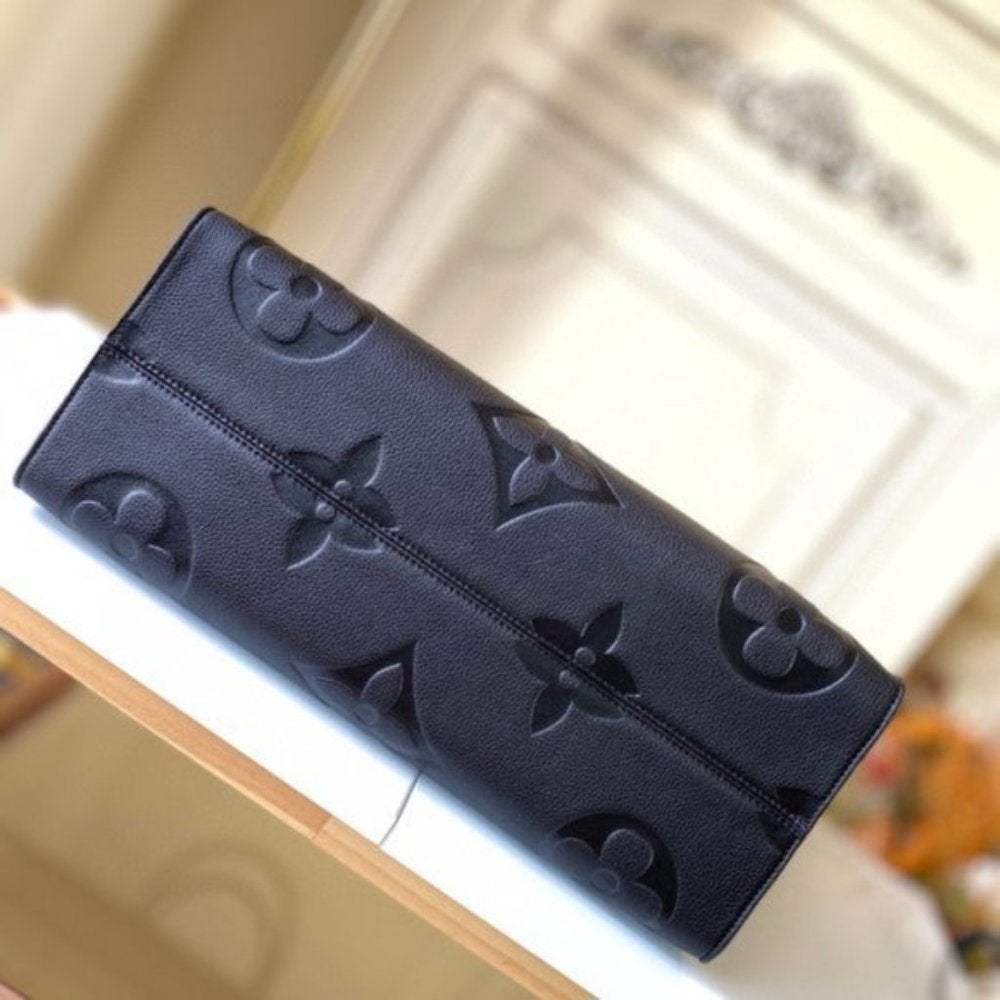 Louis Vuitton Black & Beige Monogram Empreinte Onthego MM – LuxuryPromise