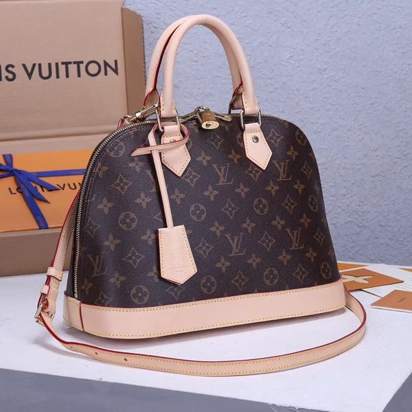 Louis Vuitton Louis Vuitton Alma Monogram Canvas Hand Bag + Strap