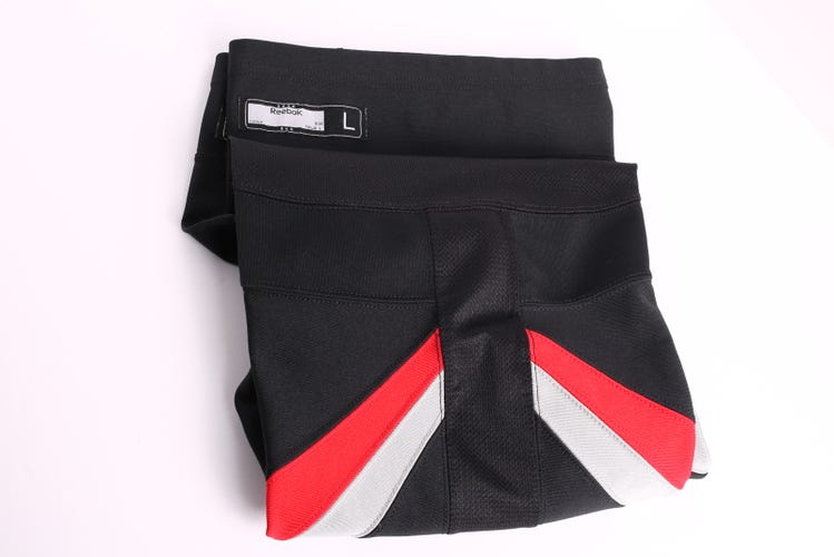 Senior Large Reebok Socks Pro Stock - CAROLINA HURRICANES