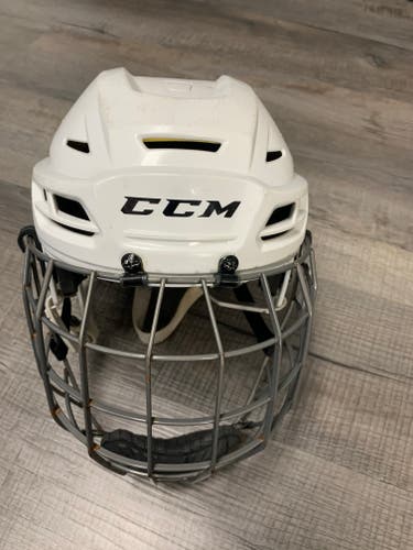Used Large White CCM  Tacks 310 Helmet with mask