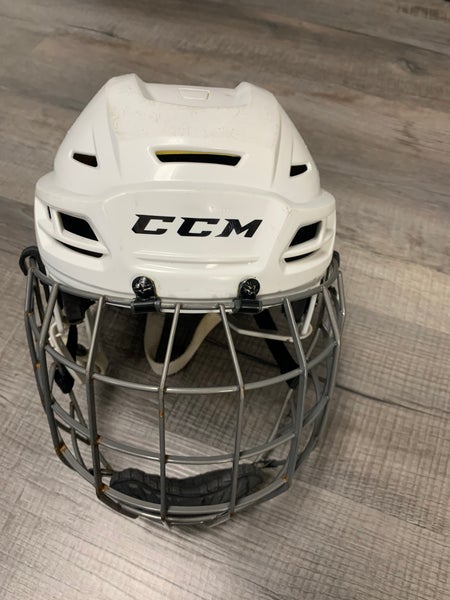 Used Large White CCM Tacks 310 Helmet with mask