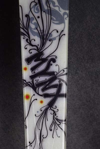 SALOMON MYNX SKIS SIZE 166 CM WITH ROSSIGNOL BINDINGS