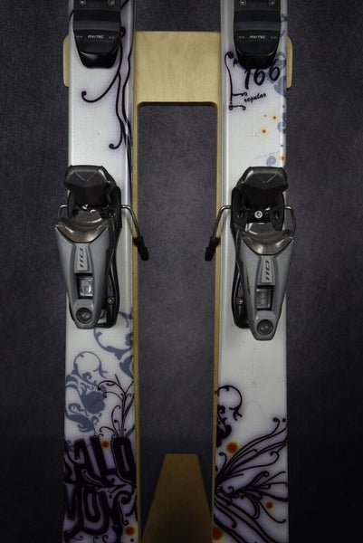 SALOMON MYNX SKIS SIZE 166 CM WITH ROSSIGNOL BINDINGS