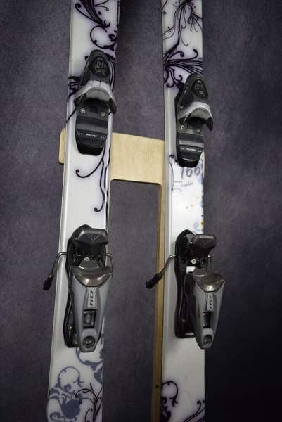 SALOMON MYNX SKIS SIZE 166 CM WITH ROSSIGNOL BINDINGS