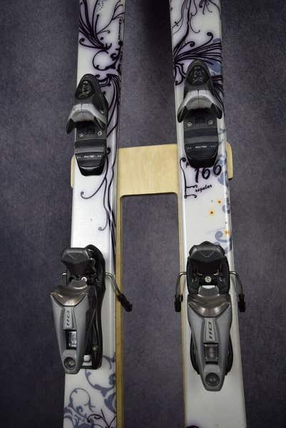 SALOMON MYNX SKIS SIZE 166 CM WITH ROSSIGNOL BINDINGS