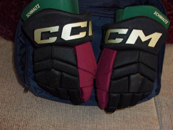 ARIZONA COYOTES Nick Schmaltz game-worn kachina/throwback CCM Pro gloves size 14 (2022-23 season)