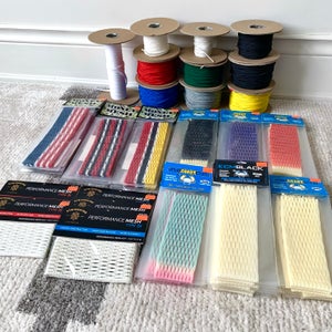 NEW East Coast Mesh (30), SK Type 1X/S (5), Money Mesh (10), USED Jimalax Stringing Spools (12)