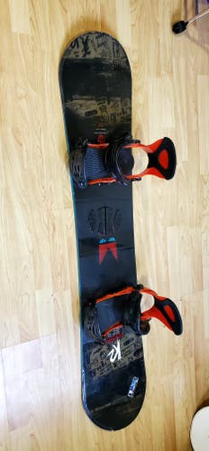 Used Unisex K2 Vandal Snowboard Freestyle With Bindings Stiff Flex True Twin 148cm flat board.