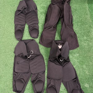 Used 4 pack youth Nike football pants