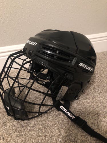Used Medium Bauer IMS 5.0 Helmet With Small Cage