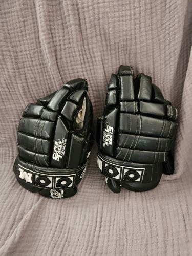 Used CCM Super Tacks 892 Gloves 13"