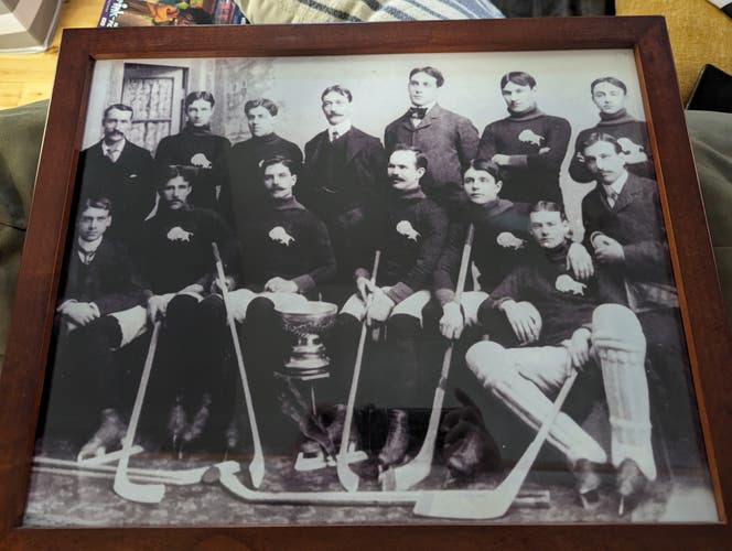 Framed reproduction of the 1901 Winnipeg Victoria's Stanley cup winning team.