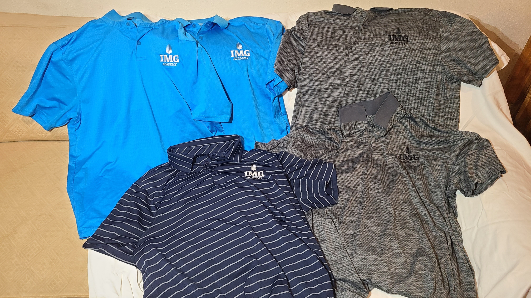 5 shirt bundle of IMG Academy Large Men's Under Armour School Polos