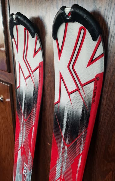 k2 amp strike skis black red 2015 w/ Salomon L10 Demo Bindings  Textured ski surfaces (aka snakeskin topsheet) are rough surfaces to the ski that hide or repel scratches keep your skis look new long after they are not K2 Amp Strike Jr Skis